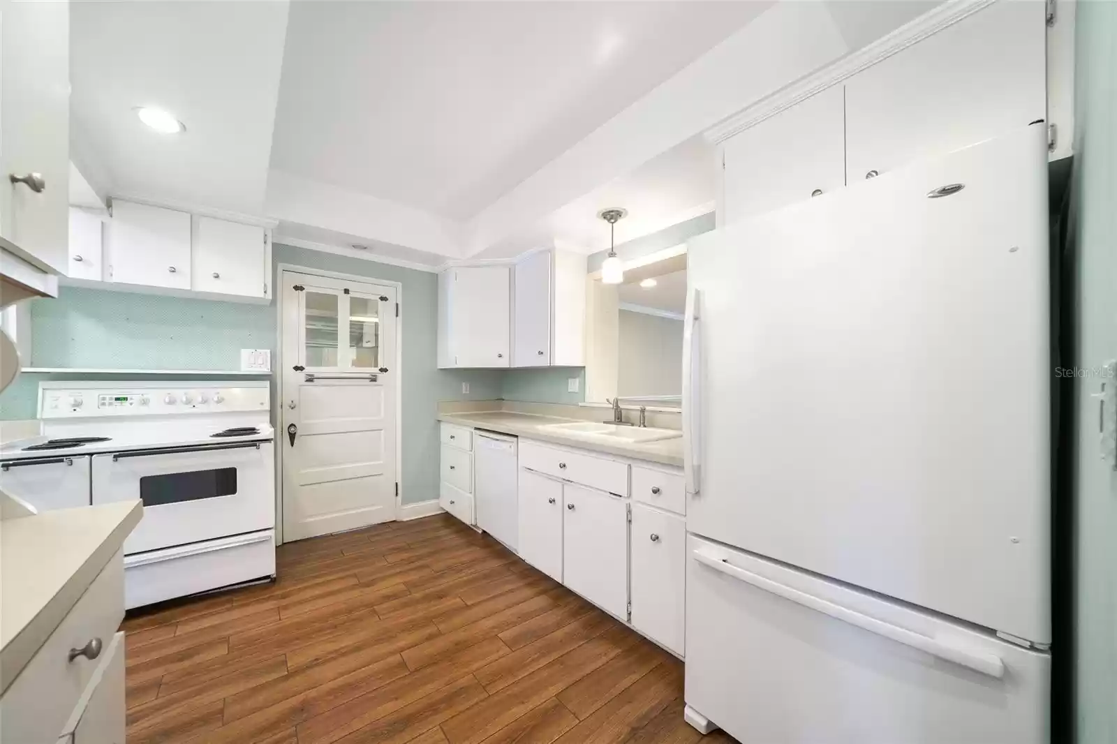 Kitchen entrance off center hallway