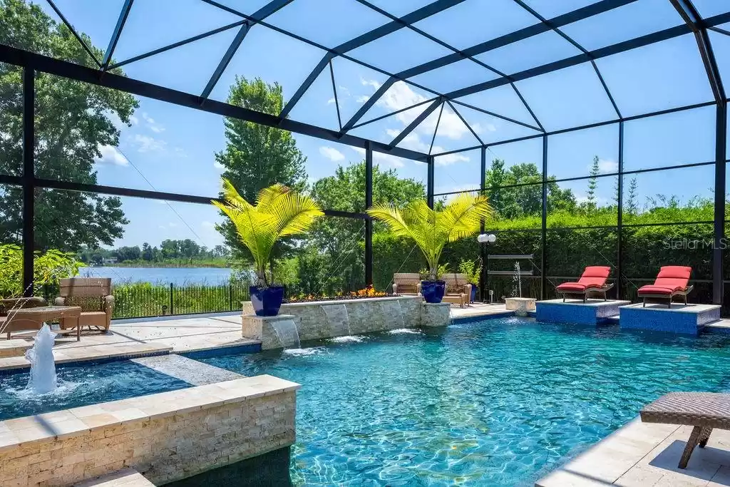 Backyard - Lake view + heated saltwater pool & spa