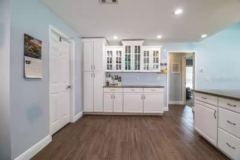 Custom crafted maple cabinets with glass panels