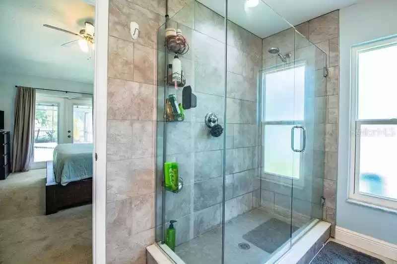 Seamless Glass Shower Enclosure.