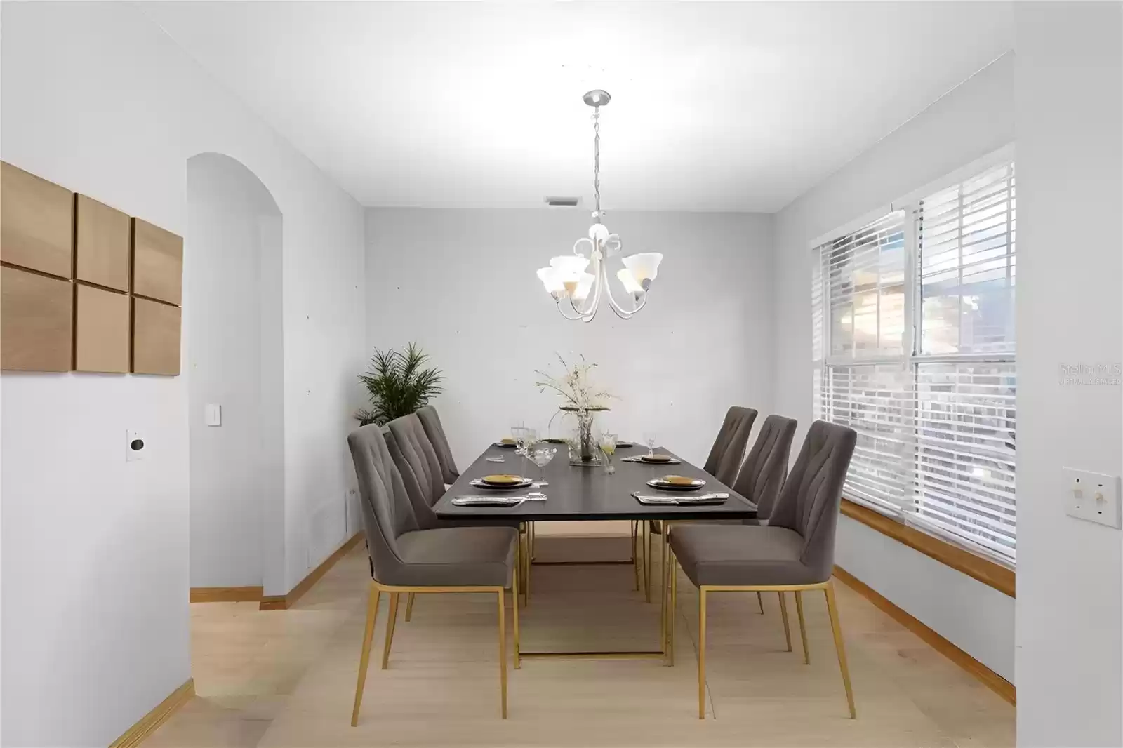 *Virtually staged* Dining area. Kitchen at left.