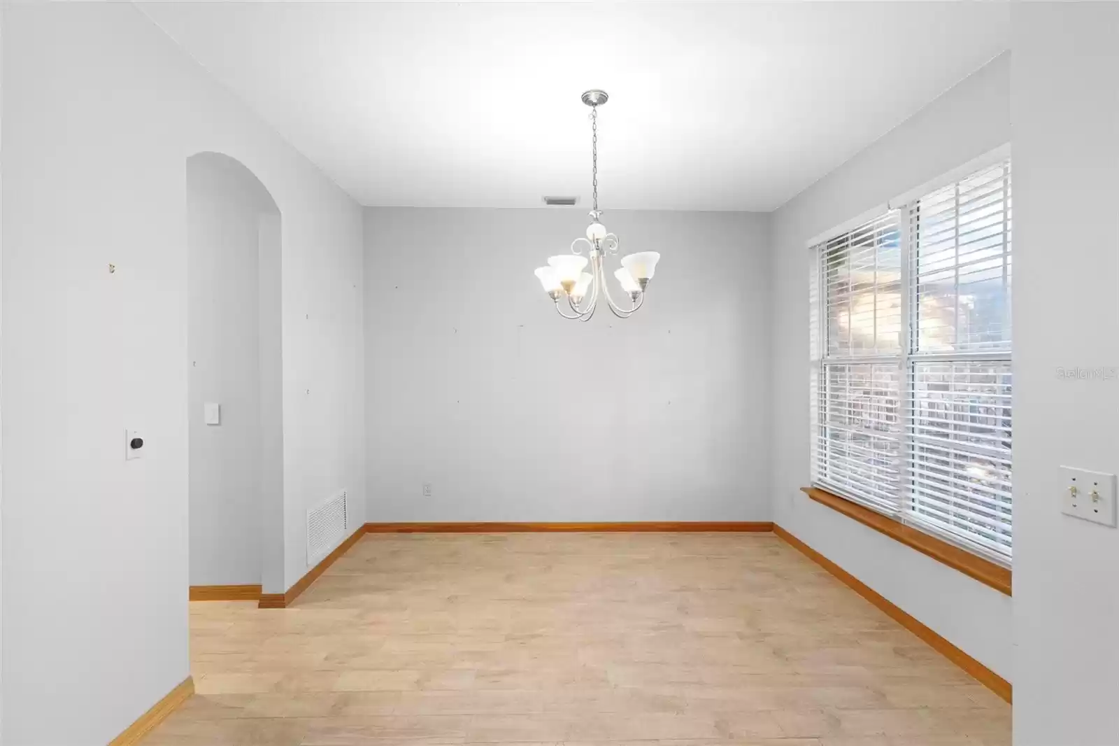 Dining area. Kitchen at left.