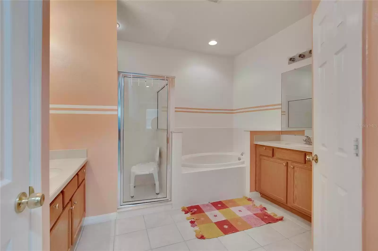 Primary En Suite with Split Vanities, Tub w/Separate Shower Stall and Private Water Closet