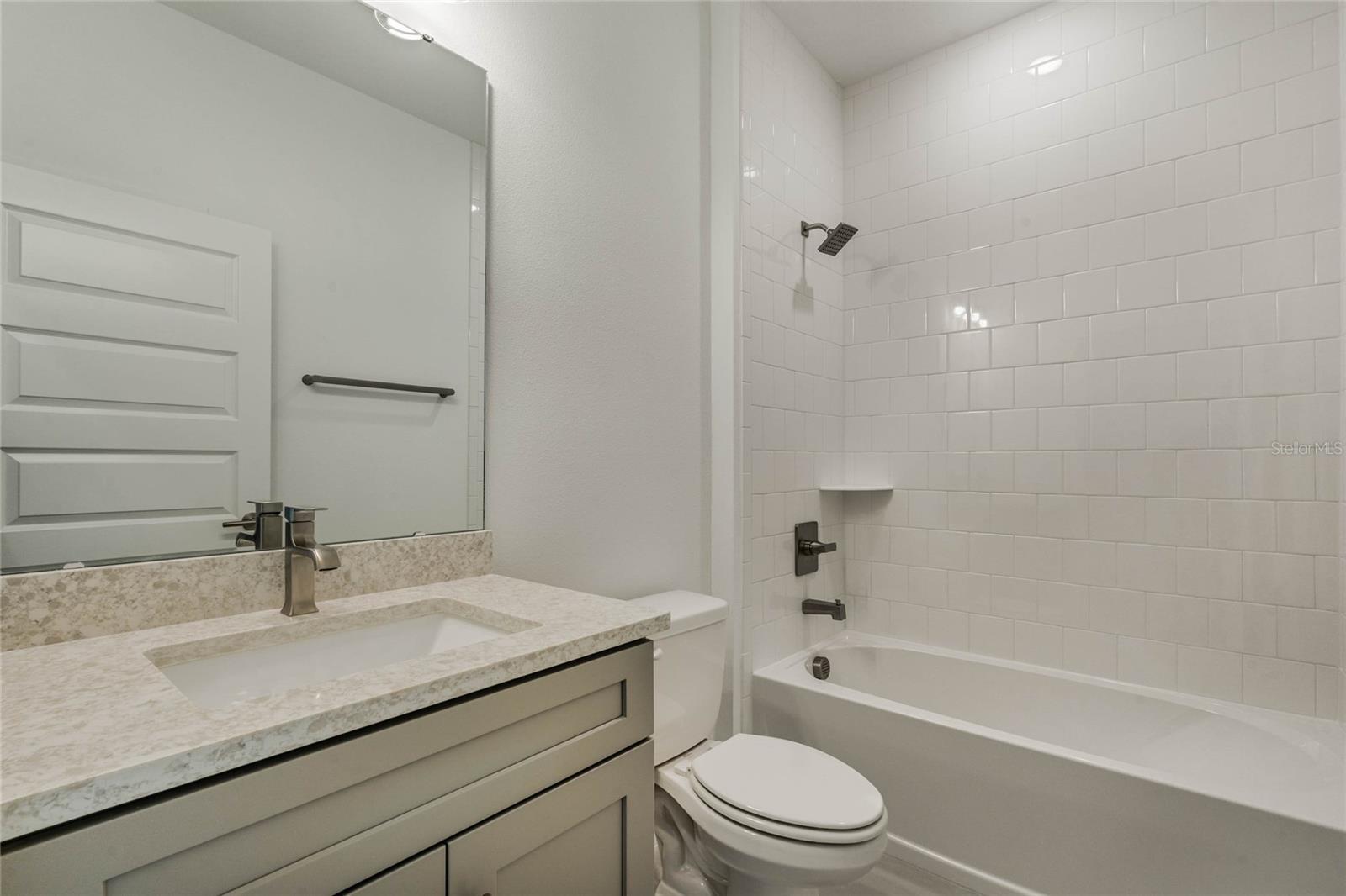 First Floor Bathroom (representative photo)