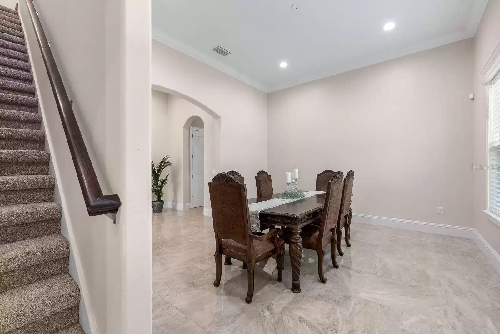 Formal dining and secondary stairway