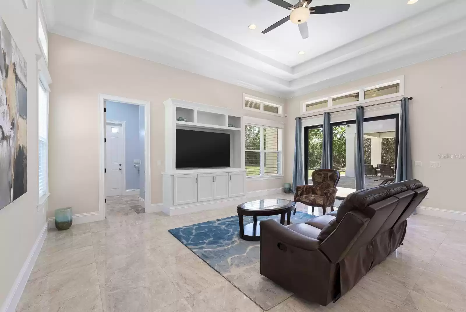 Family room with entrance to guest bathroom