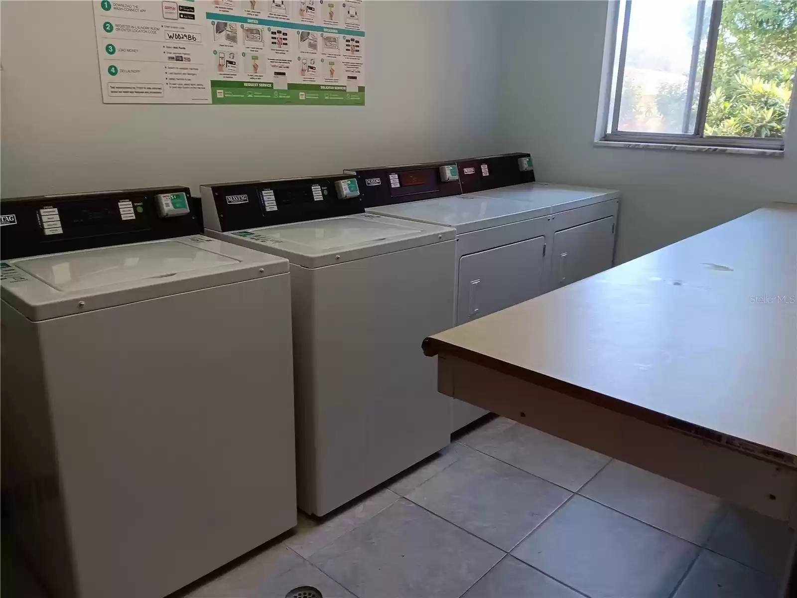 Laundry room in hallway