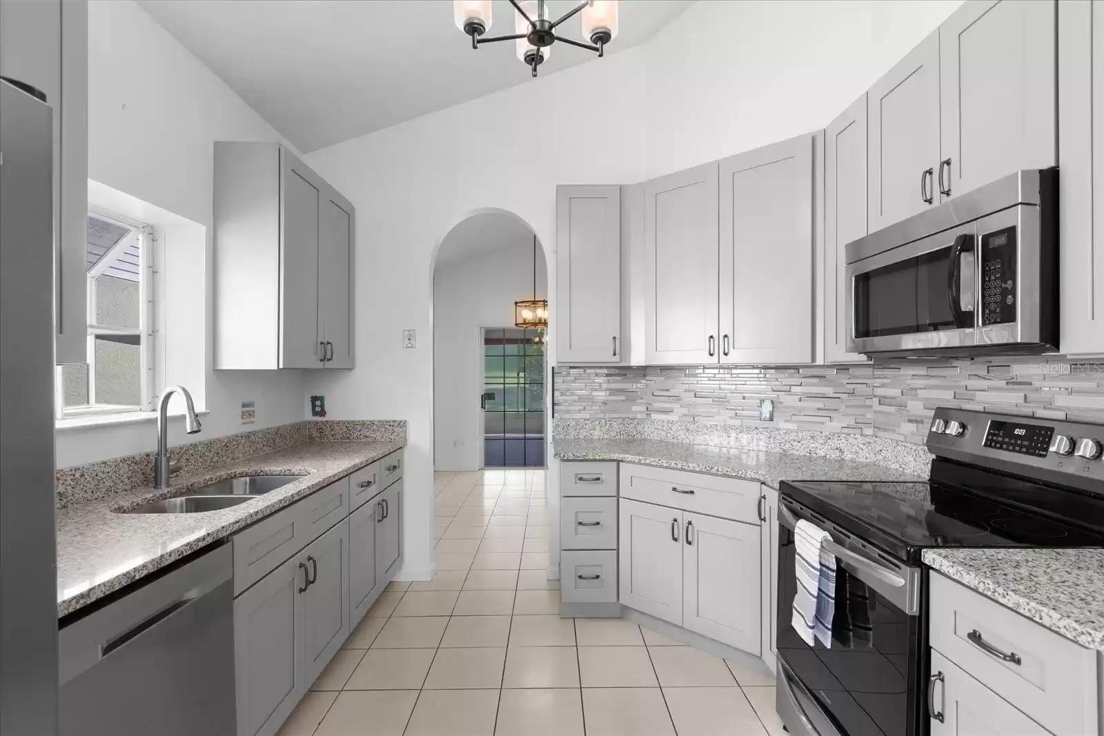 Breakfast nook behind, entry door to right