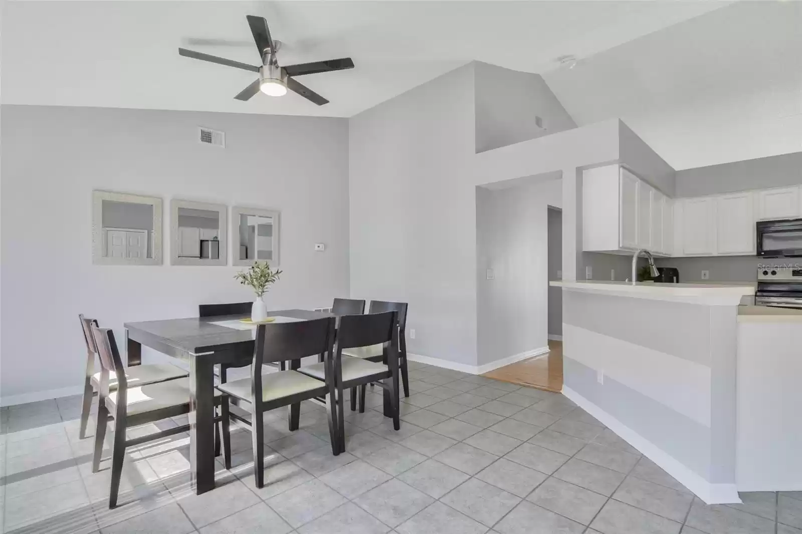 Open the kitchen the family room is a perfect gathering space, flexible to use however you might need, with TILE FLOORS for easy maintenance.