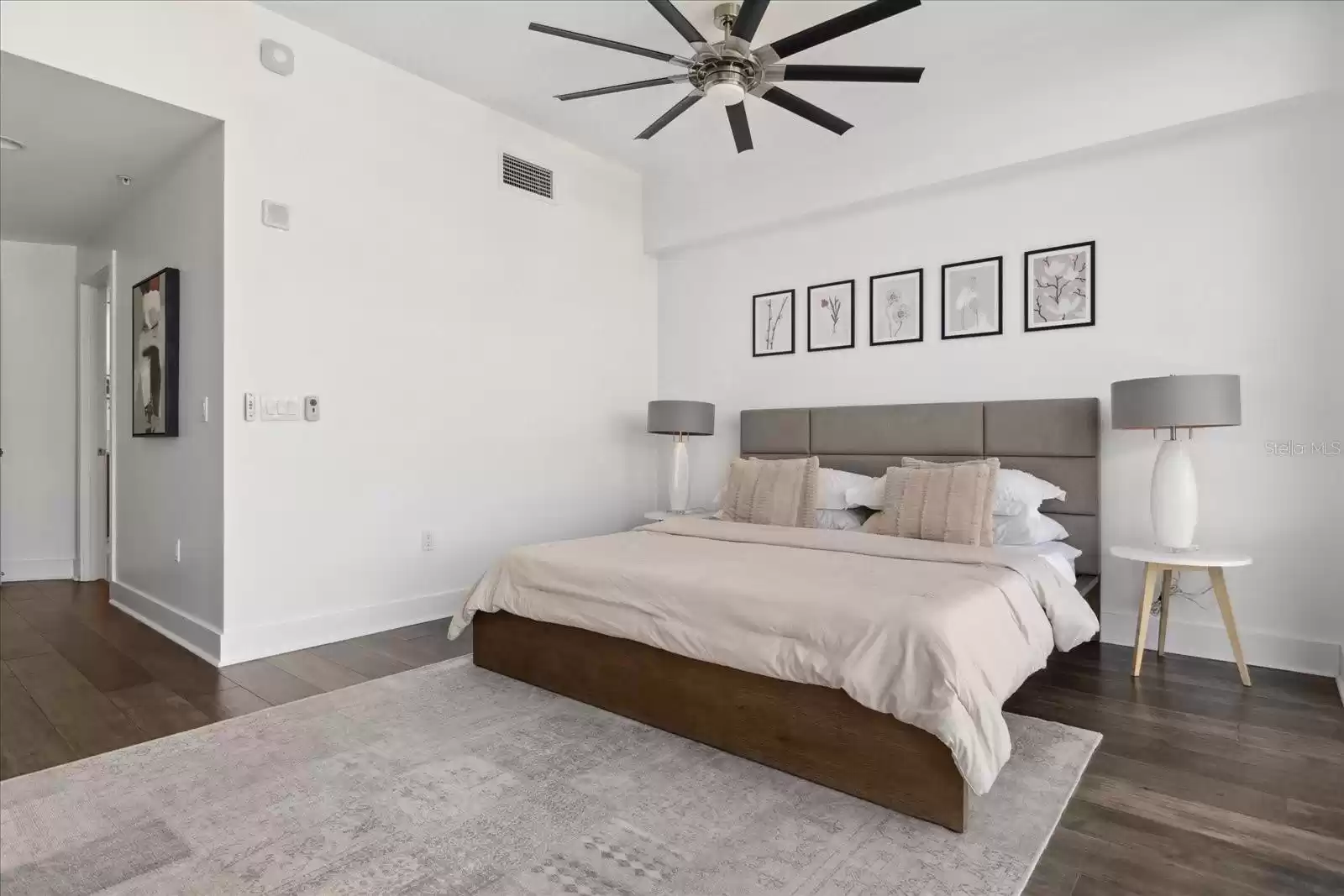 Master bedroom, hallway leading to bath (right)