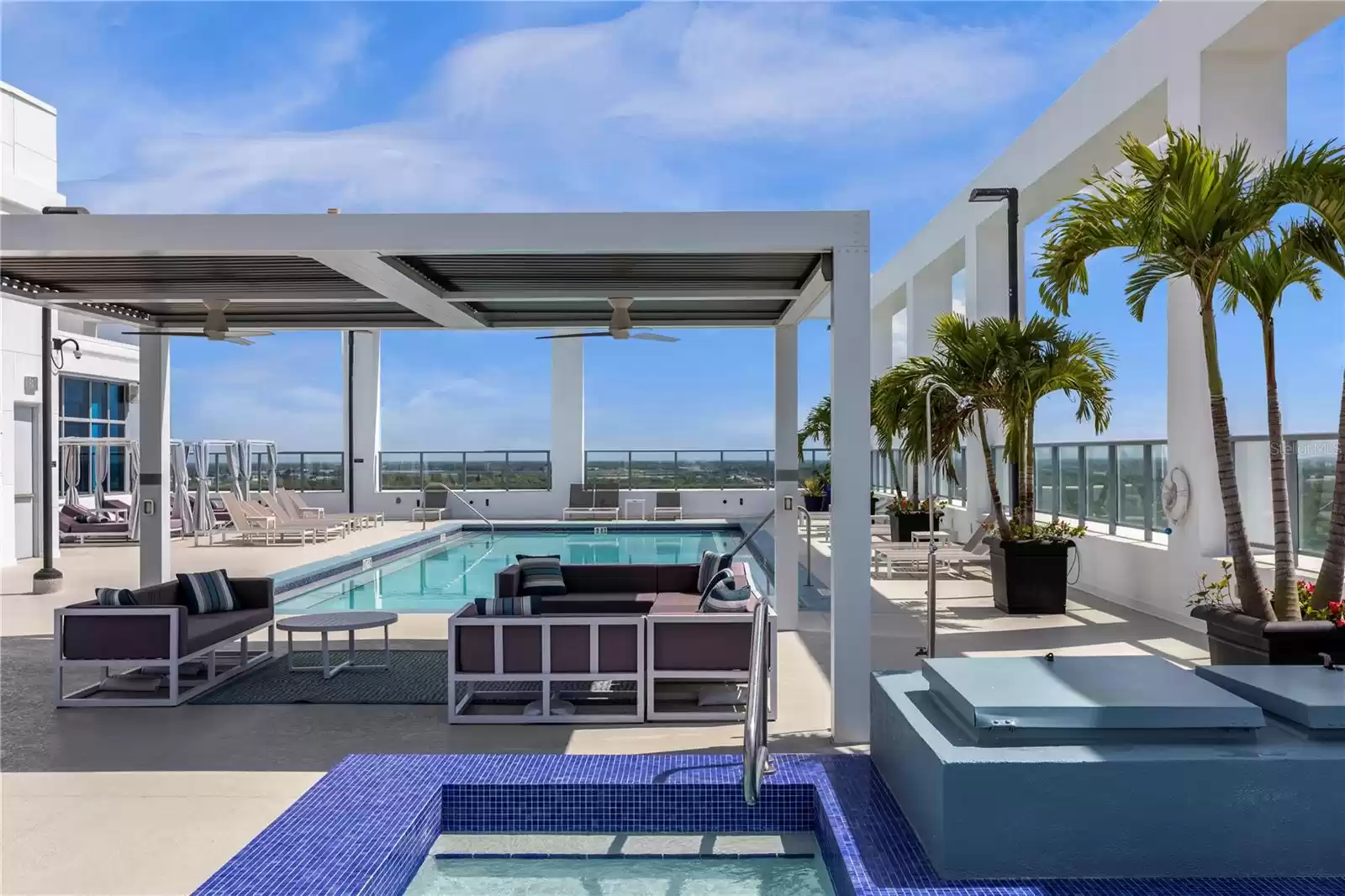 Hot tub and pool, with covered shade