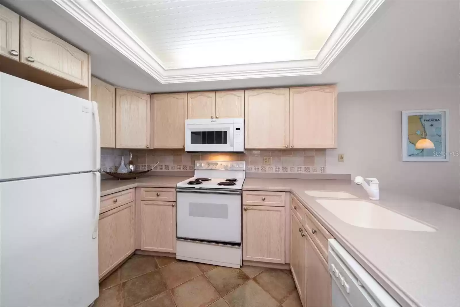 Kitchen with bead board ceiling details.