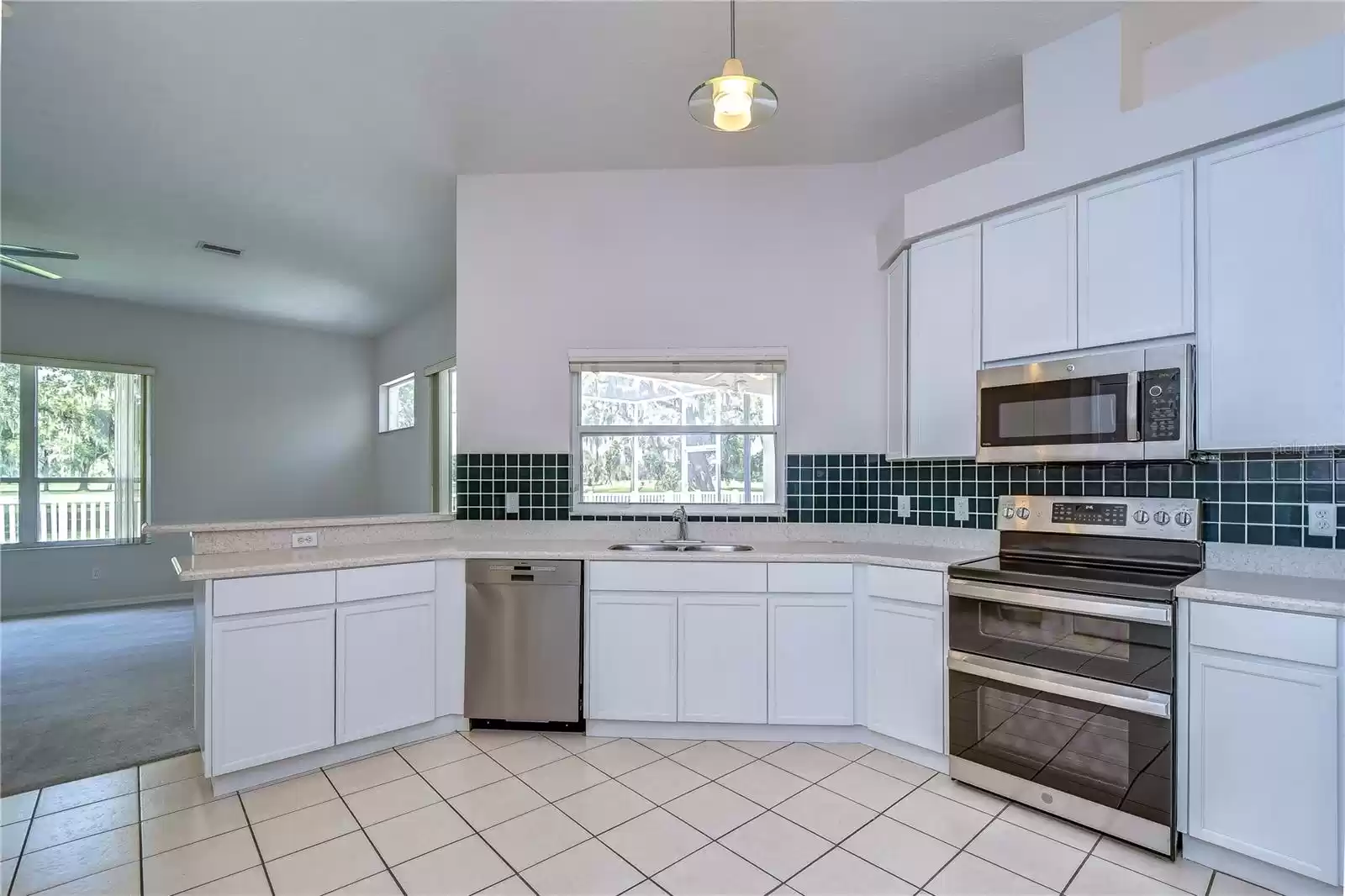 White cabinets and easy to clean tile floors!