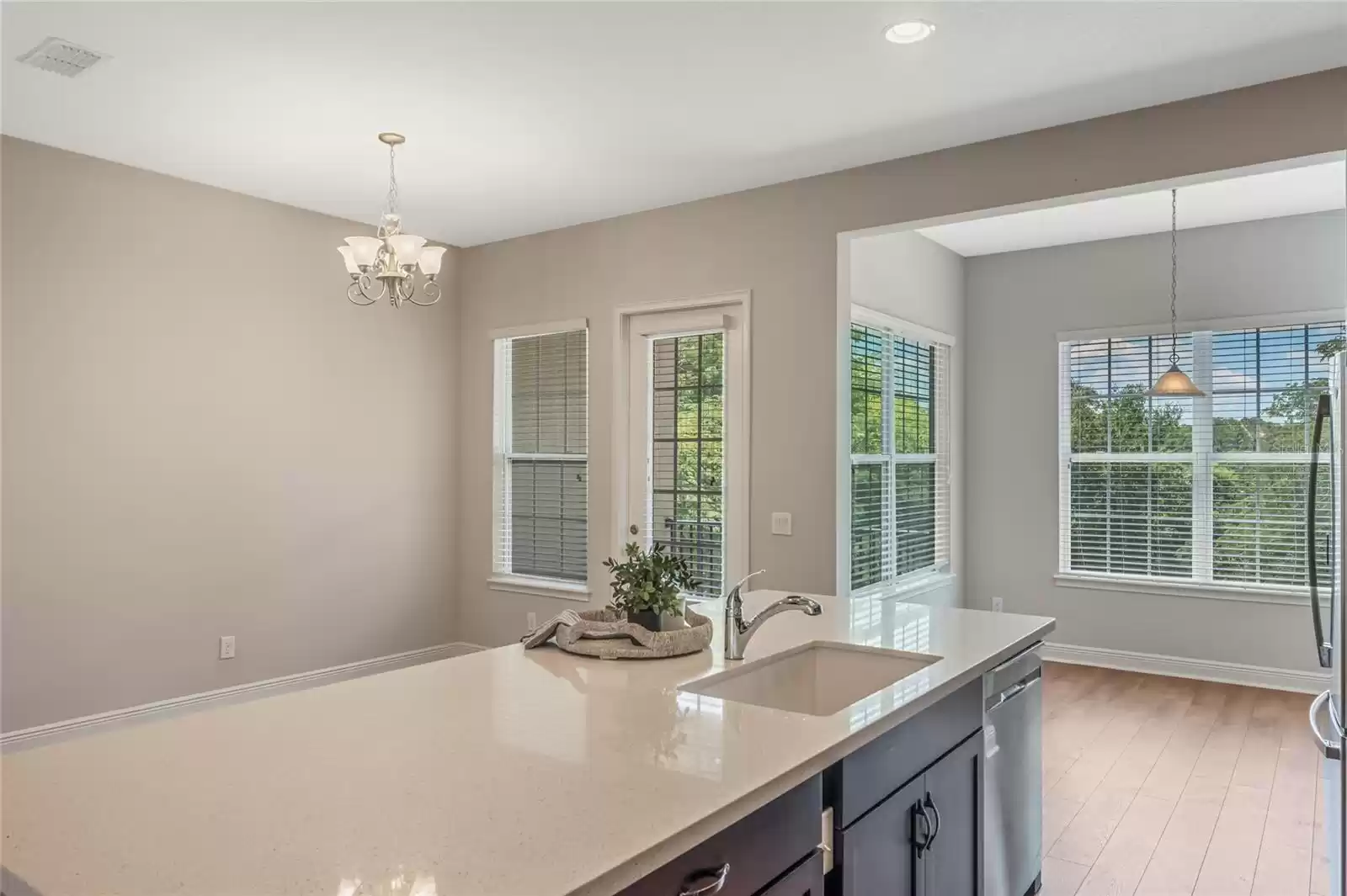 Kitchen with view of sitting area, dining area, and conservation