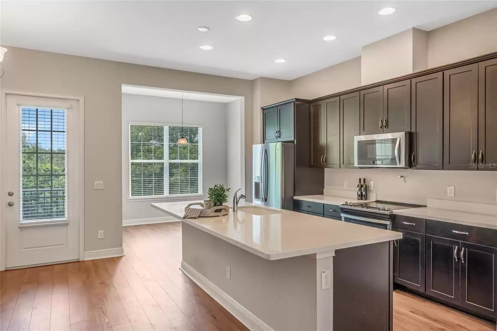 View from living room to kitchen and dining area