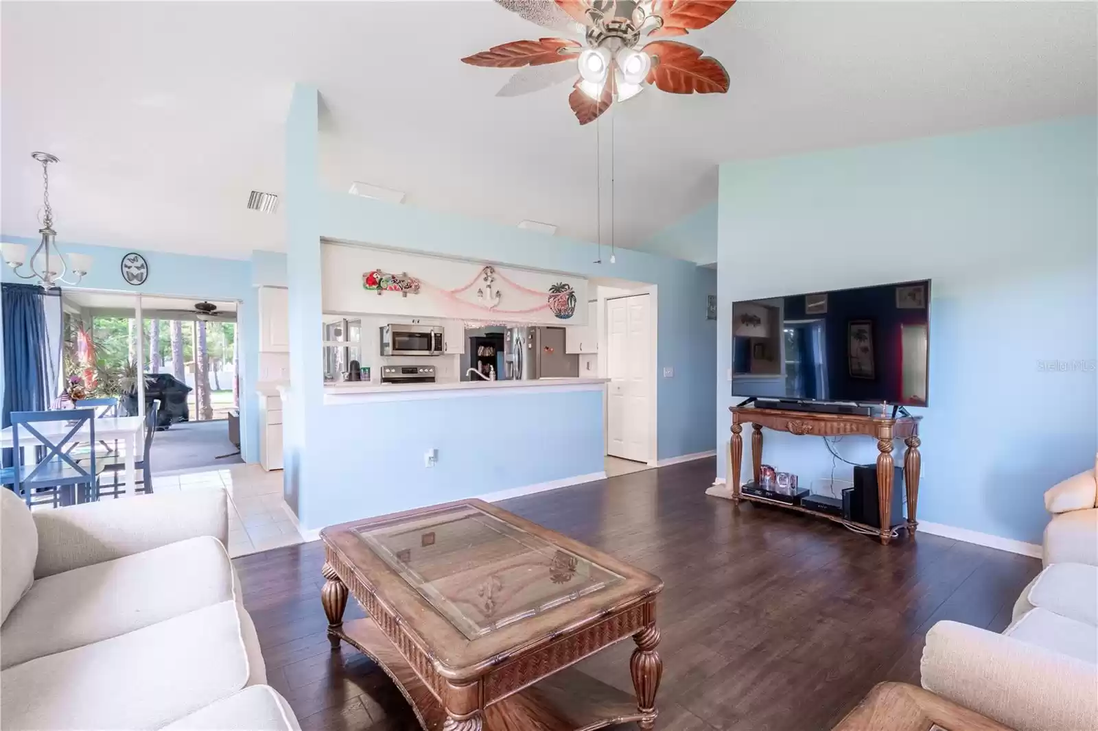 The family room is open to the kitchen and breakfast nook.