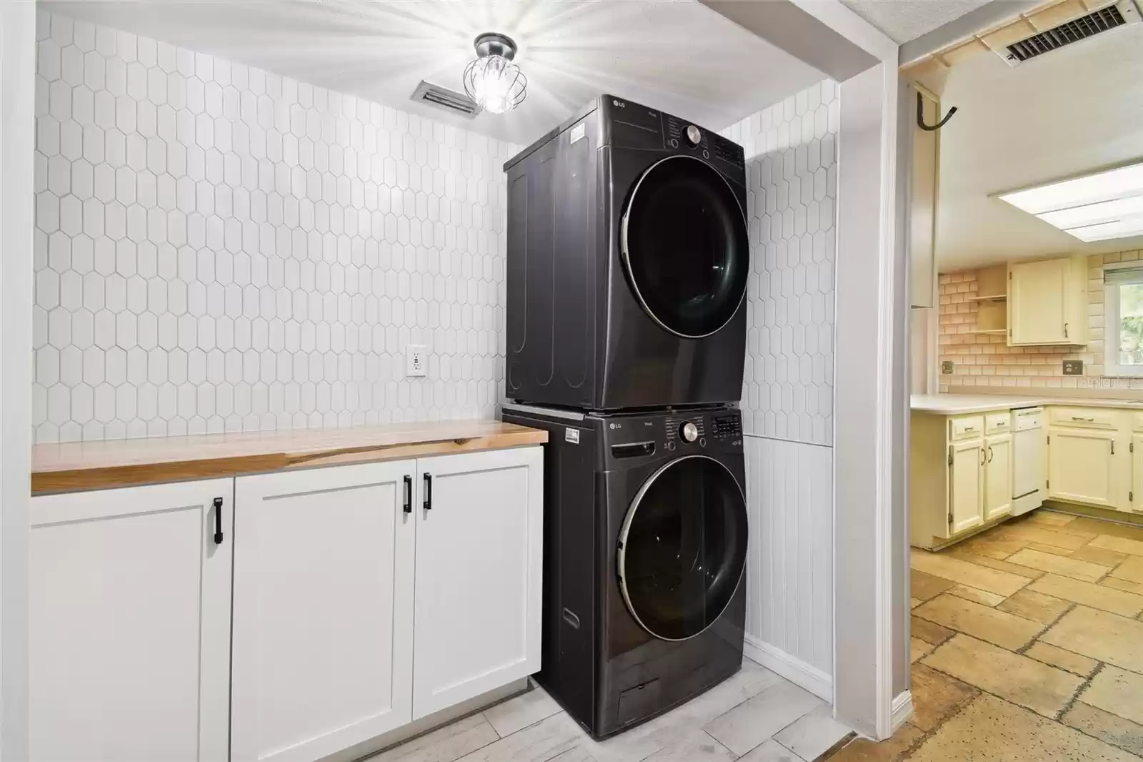 Downstairs laundry off kitchen