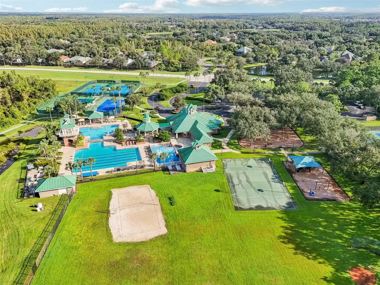 Community Club - Aerial view of volleyball, basketball, pool area and tennis courts