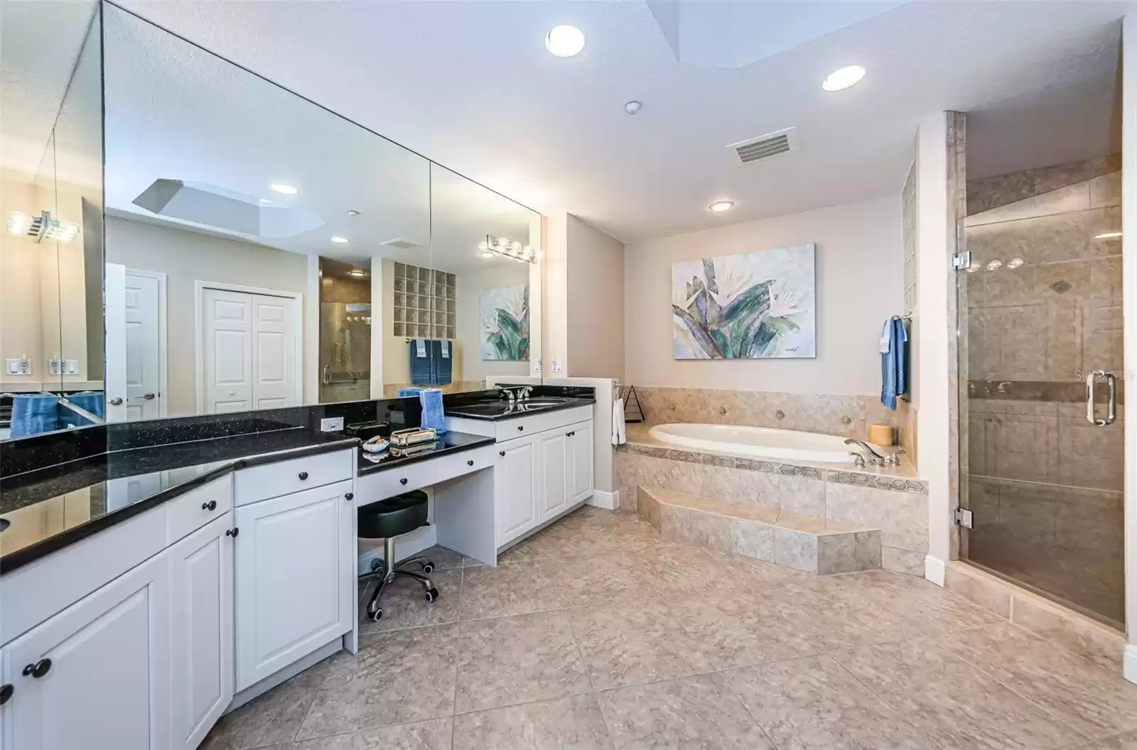 . Master Bathroom Suite Looking In.. This is a large 300 Sq Ft Bathroom Area with Two Walk in Closets in Hallway area.