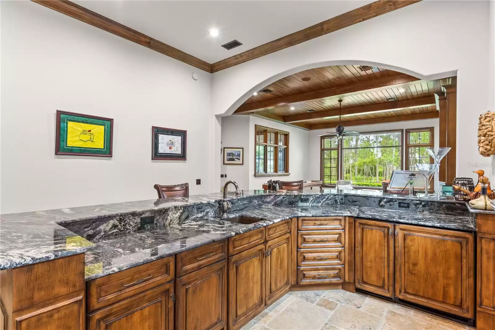 Bar area with ice maker and wine fridge