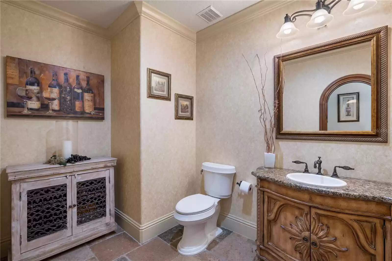 Powder Bath off the wine cellar/dining area