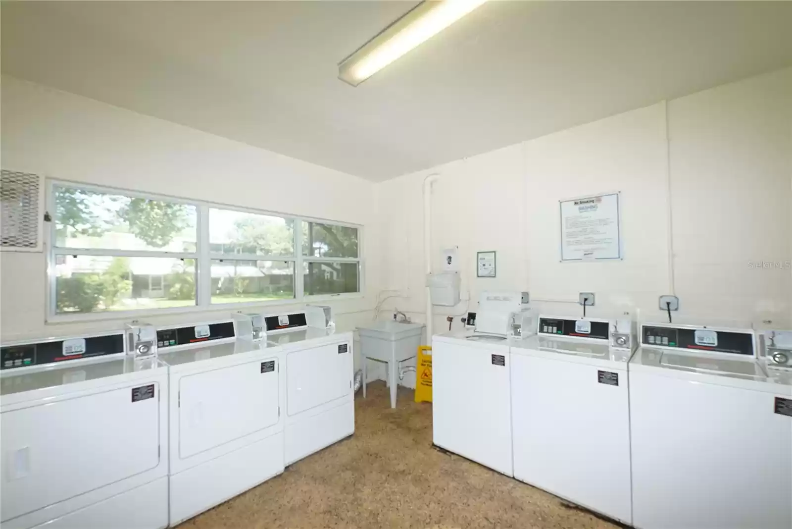 Air-Conditioned Laundry room in the same building