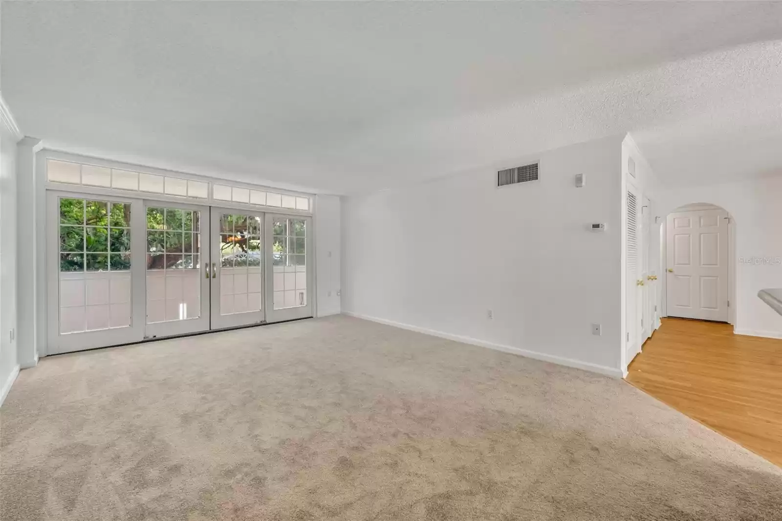 Living room overlooking Balcony and looking towards the bedrooms