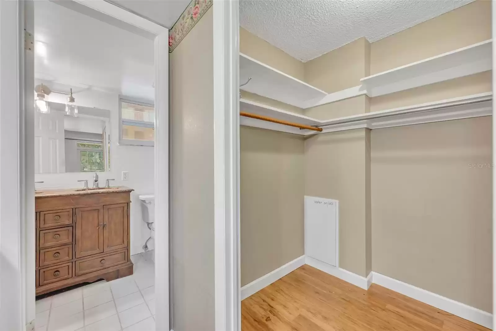 Closet looking into the bathroom