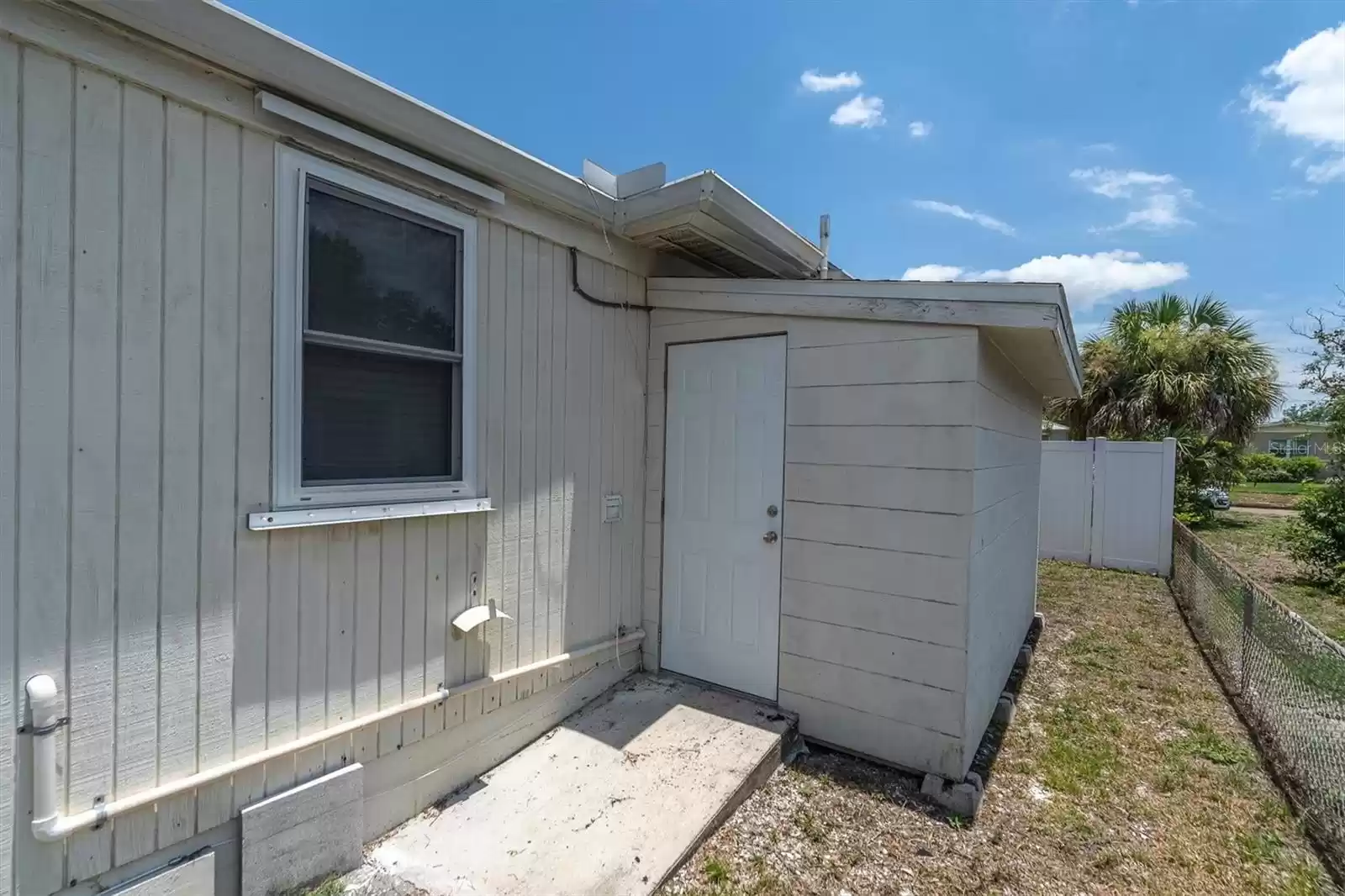 2nd shed, attached to home with electric.