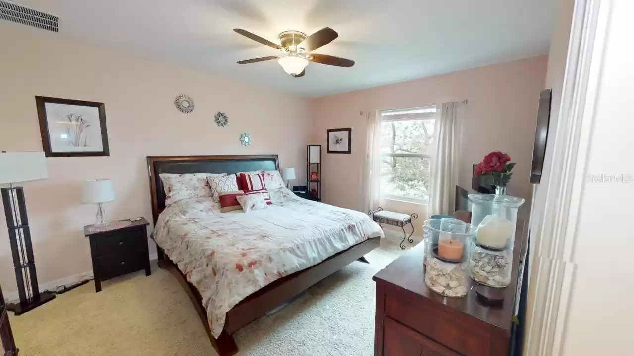 Spacious master suite with two walk in closets