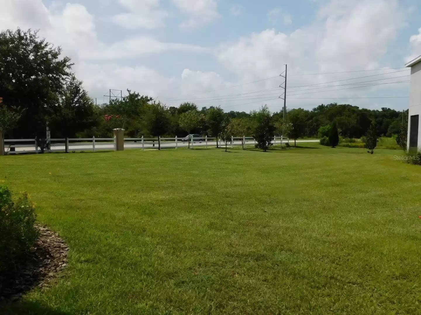 Large Vacant lot to the right of the home.