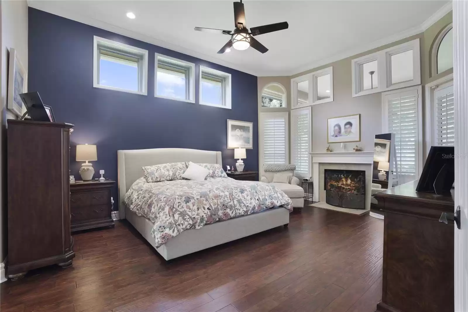 Primary Suite with Fireplace and Plantation shutters