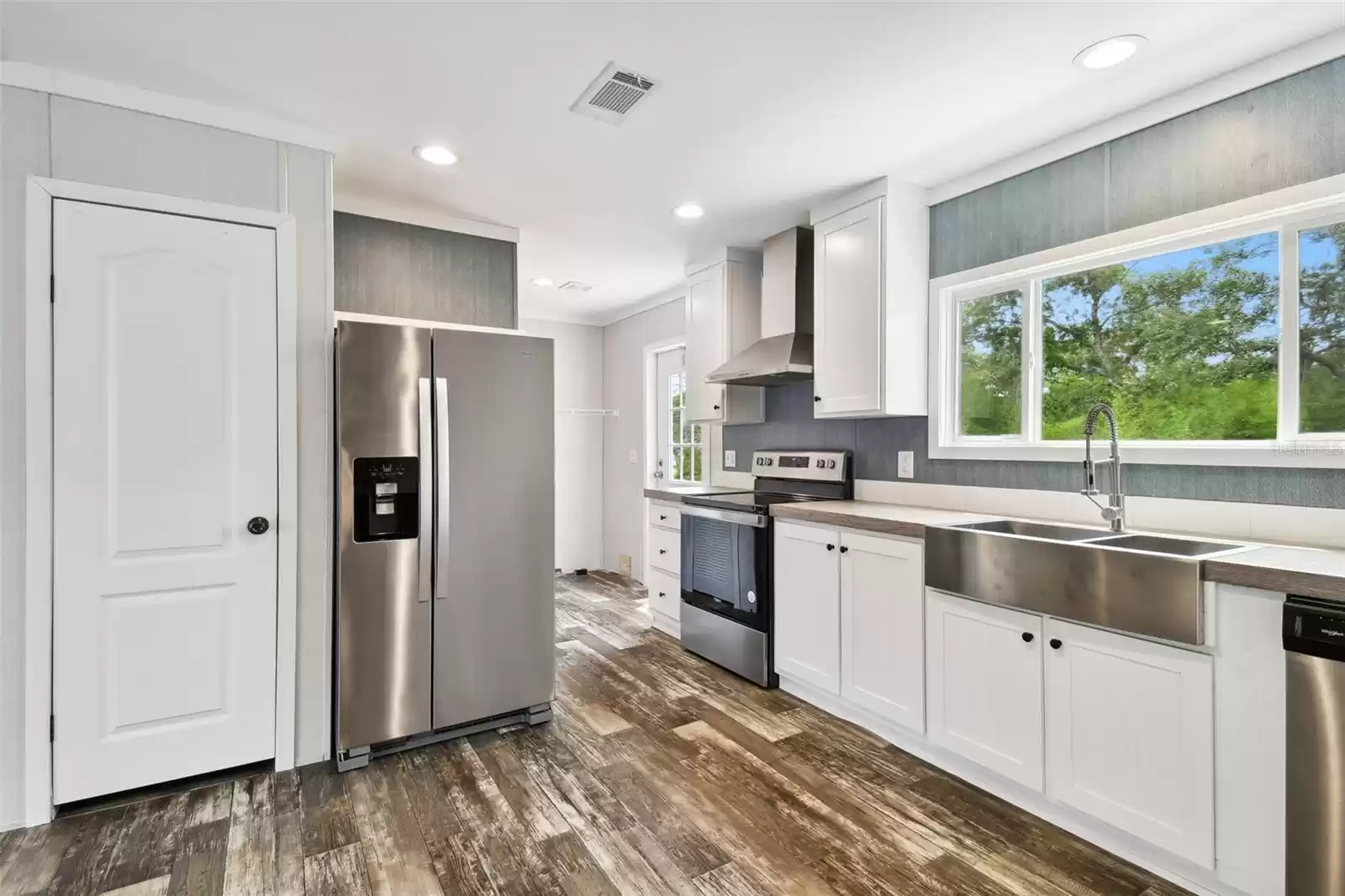 Stainless Steel Appliances And Drop-In Sink