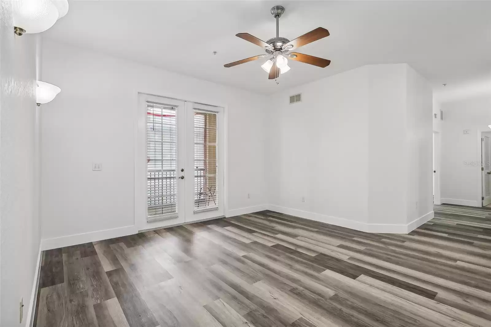 Living room with French doors to balcony