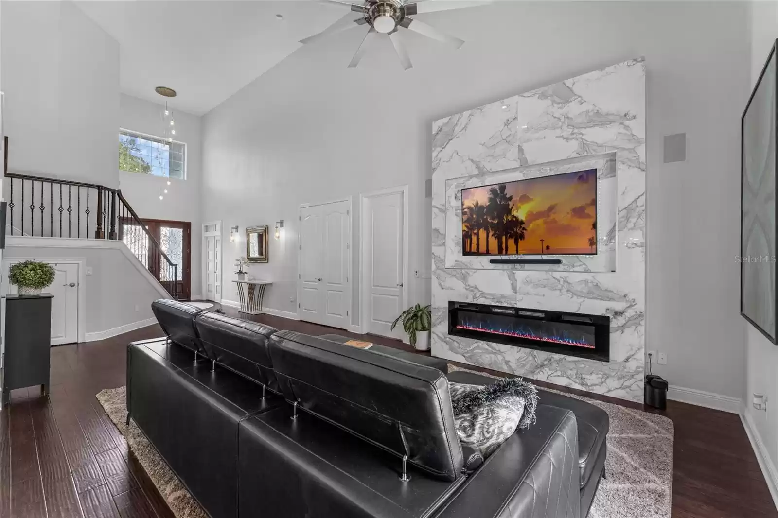 Living area with vaulted ceilings.