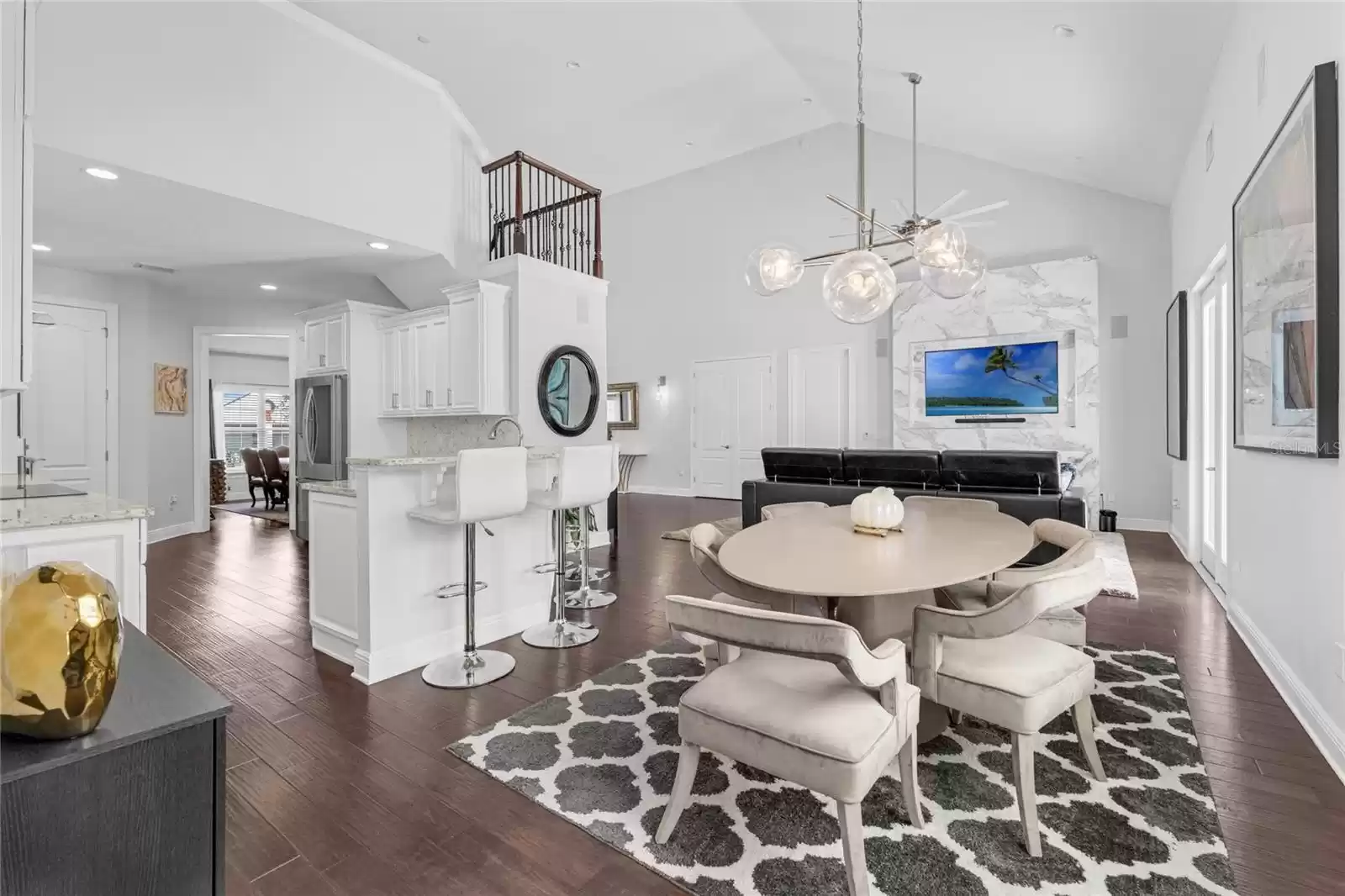 Open floor plan with vaulted ceilings.