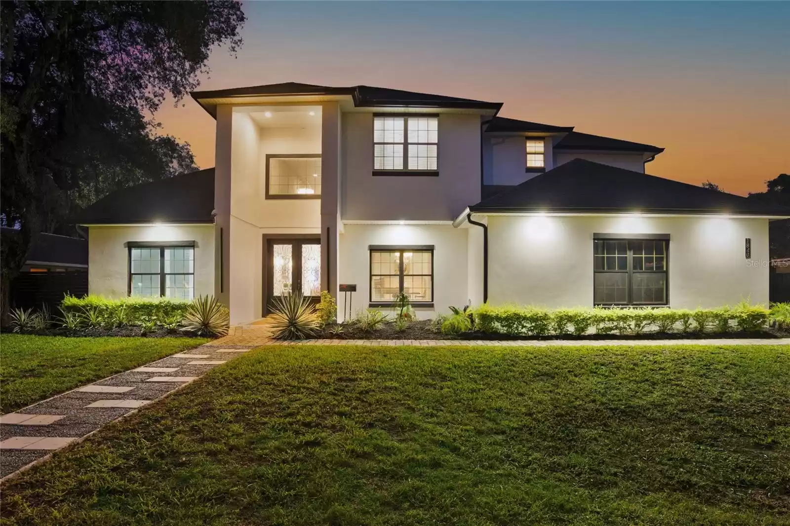 Front of the home during twilight