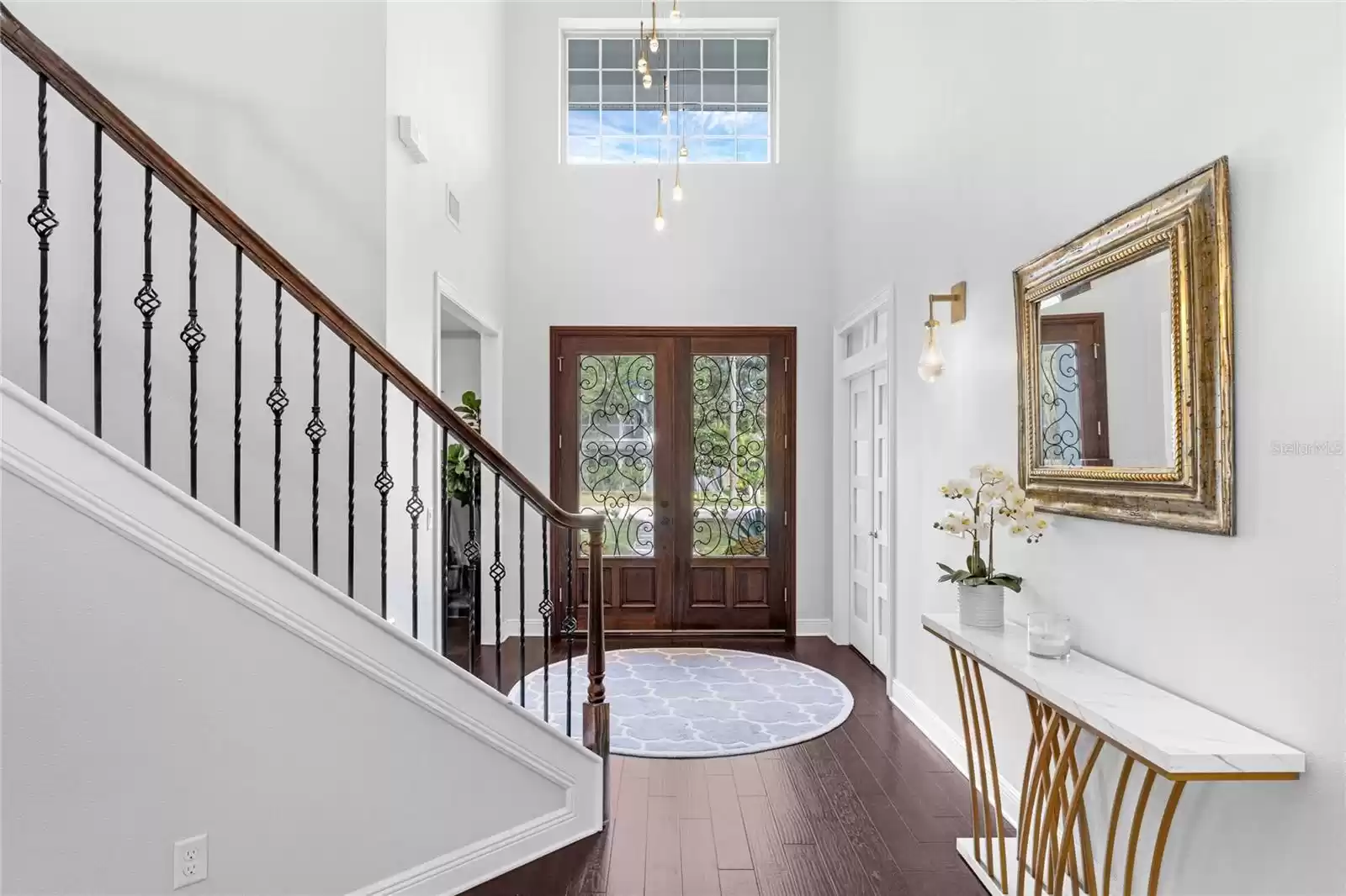 Beautiful foyer with decorative lighting.