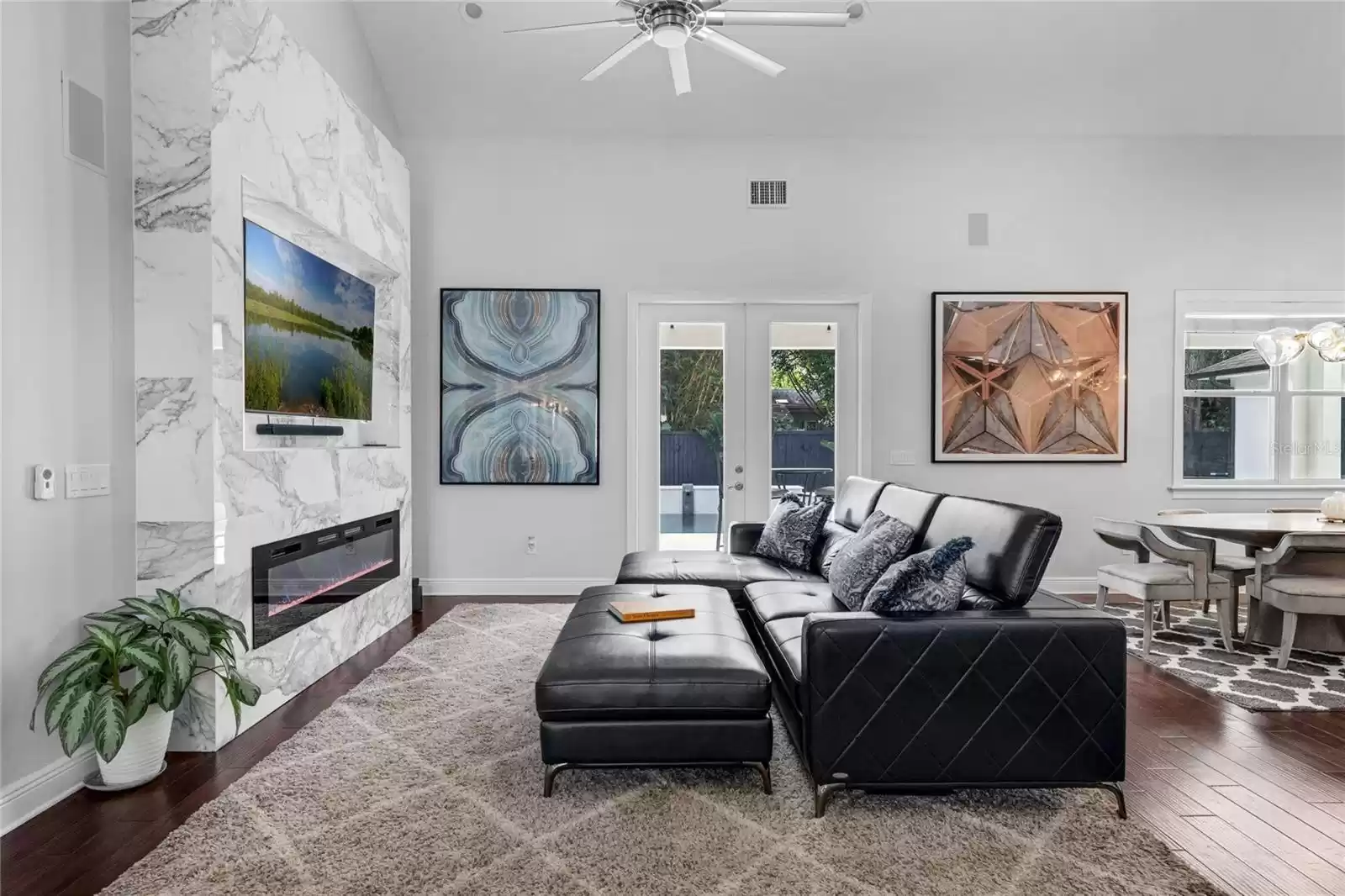 Living area with vaulted ceilings.