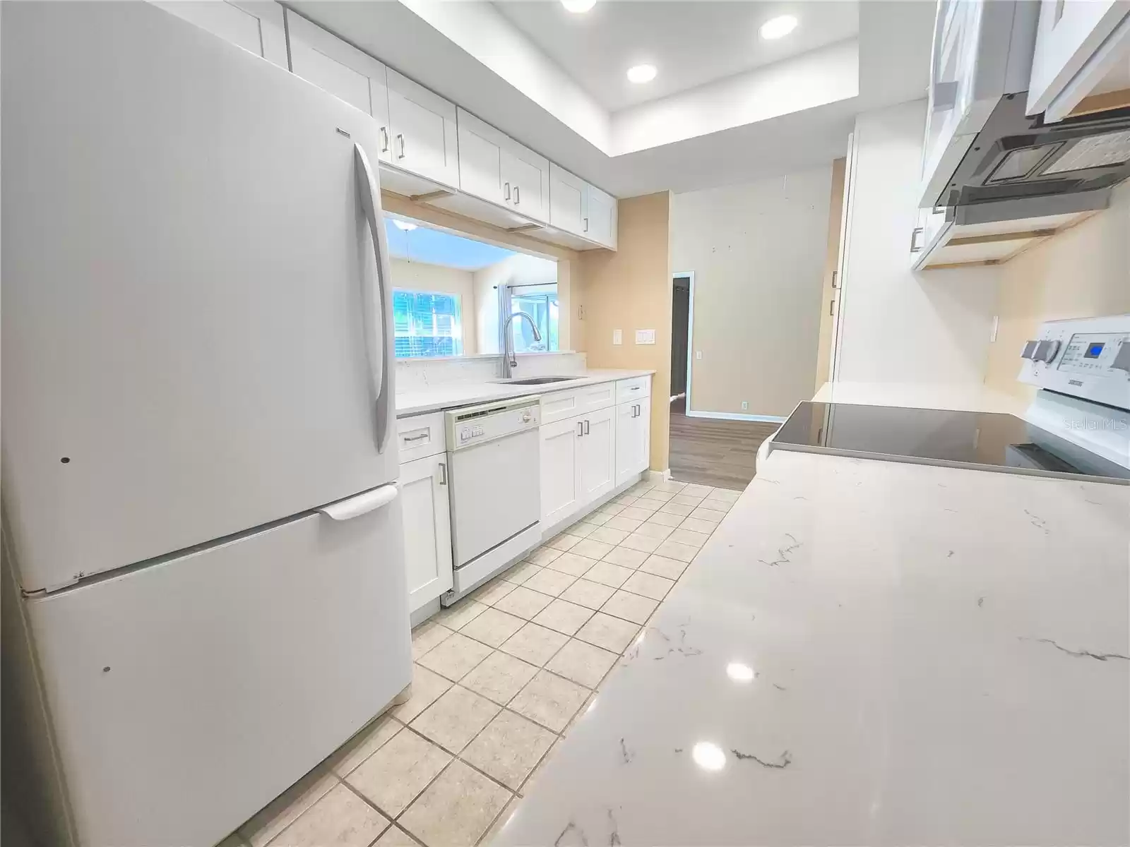 Kitchen With New Quartz Countertop & Shaker Cabinets