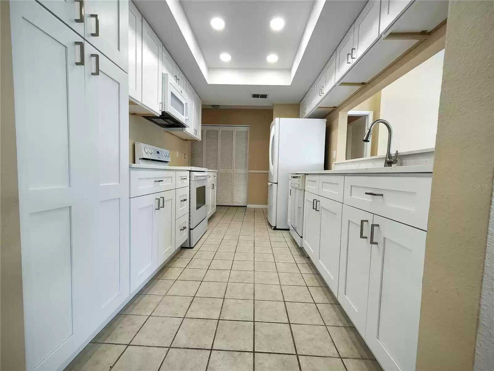 Kitchen With New Quartz Countertop & Shaker Cabinets