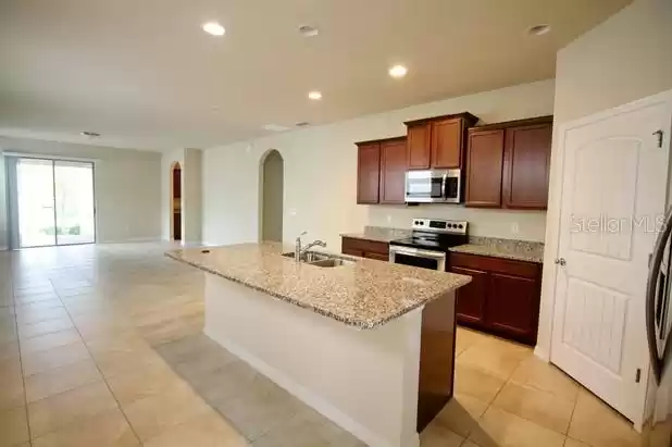 16253 PEBBLE BLUFF LOOP, WINTER GARDEN, Florida 34787, 3 Bedrooms Bedrooms, ,2 BathroomsBathrooms,Residential,For Sale,PEBBLE BLUFF,MFRO6216365