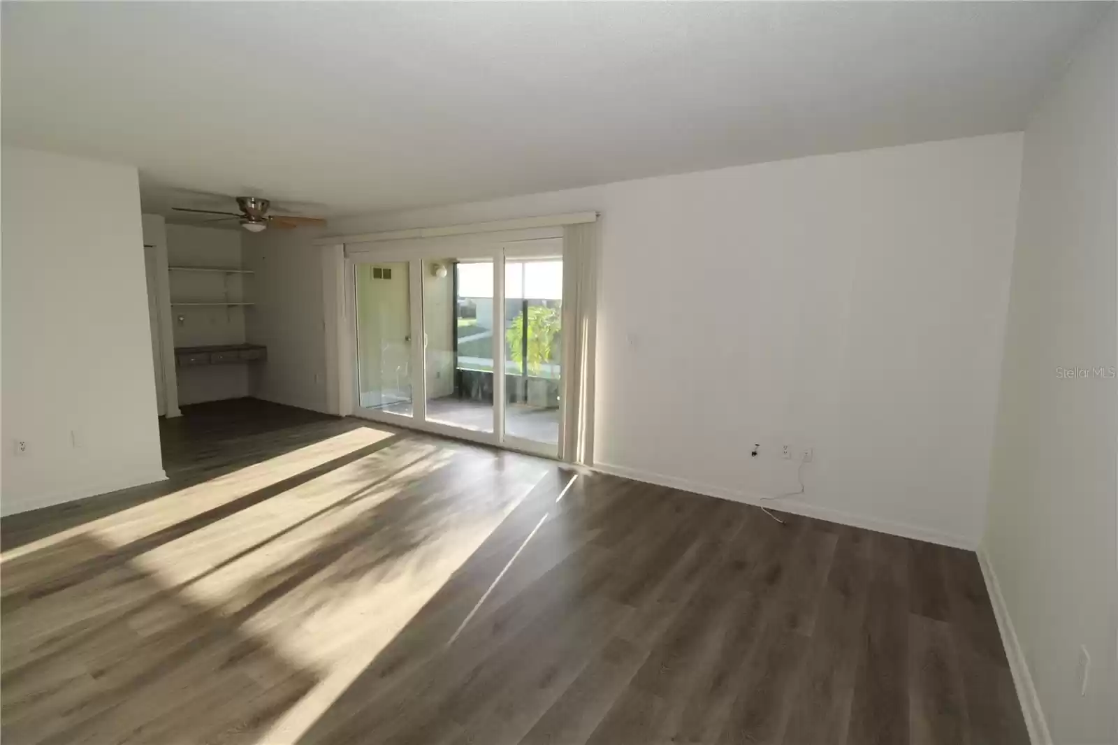 Living area, view of Dining and front porch