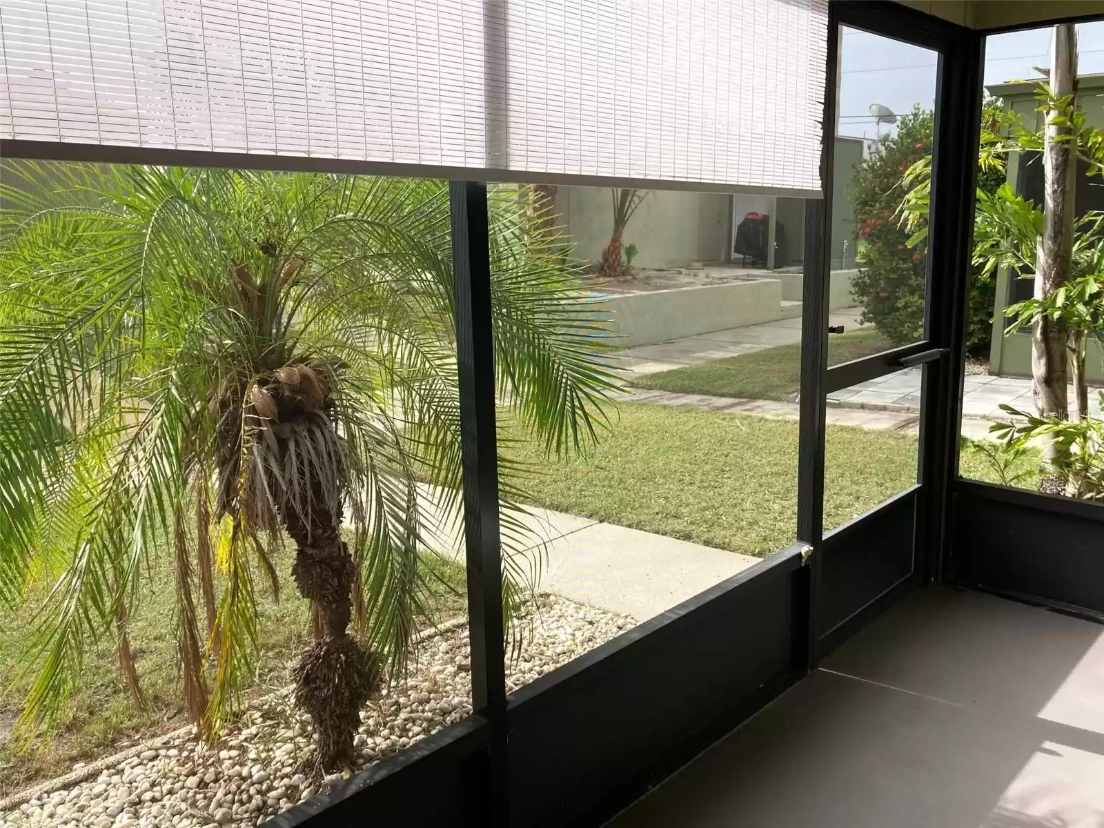 Front porch view to a quiet courtyard.