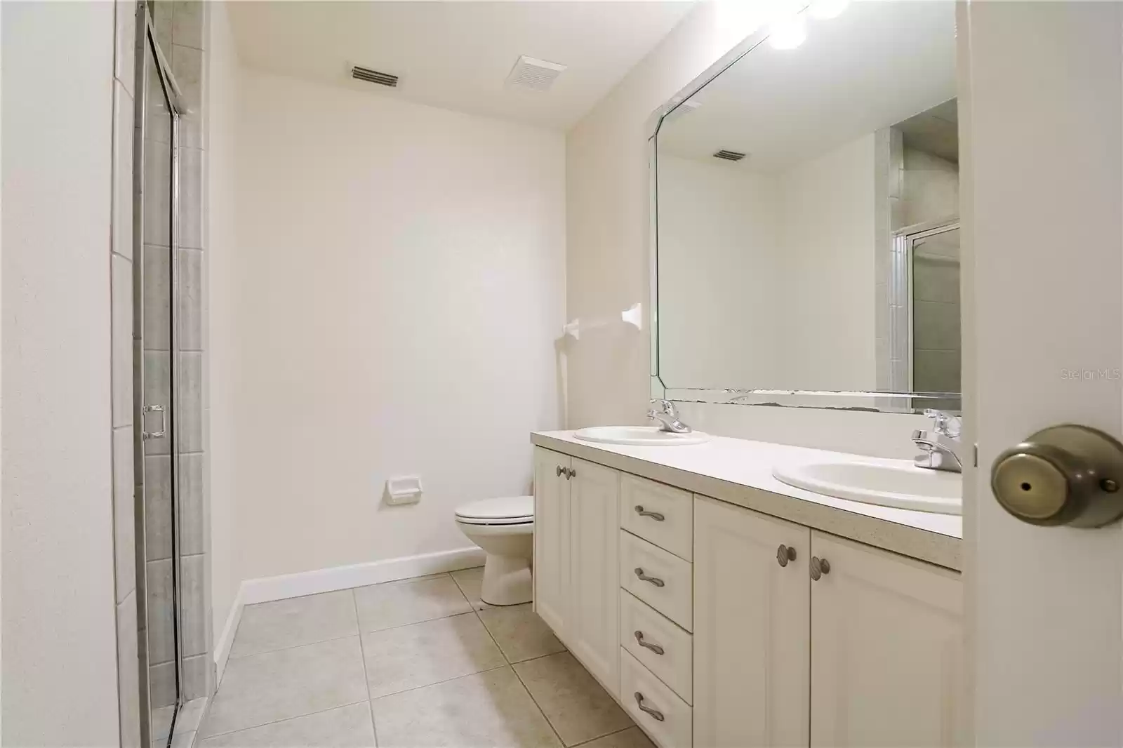 Master bathroom with dual sinks