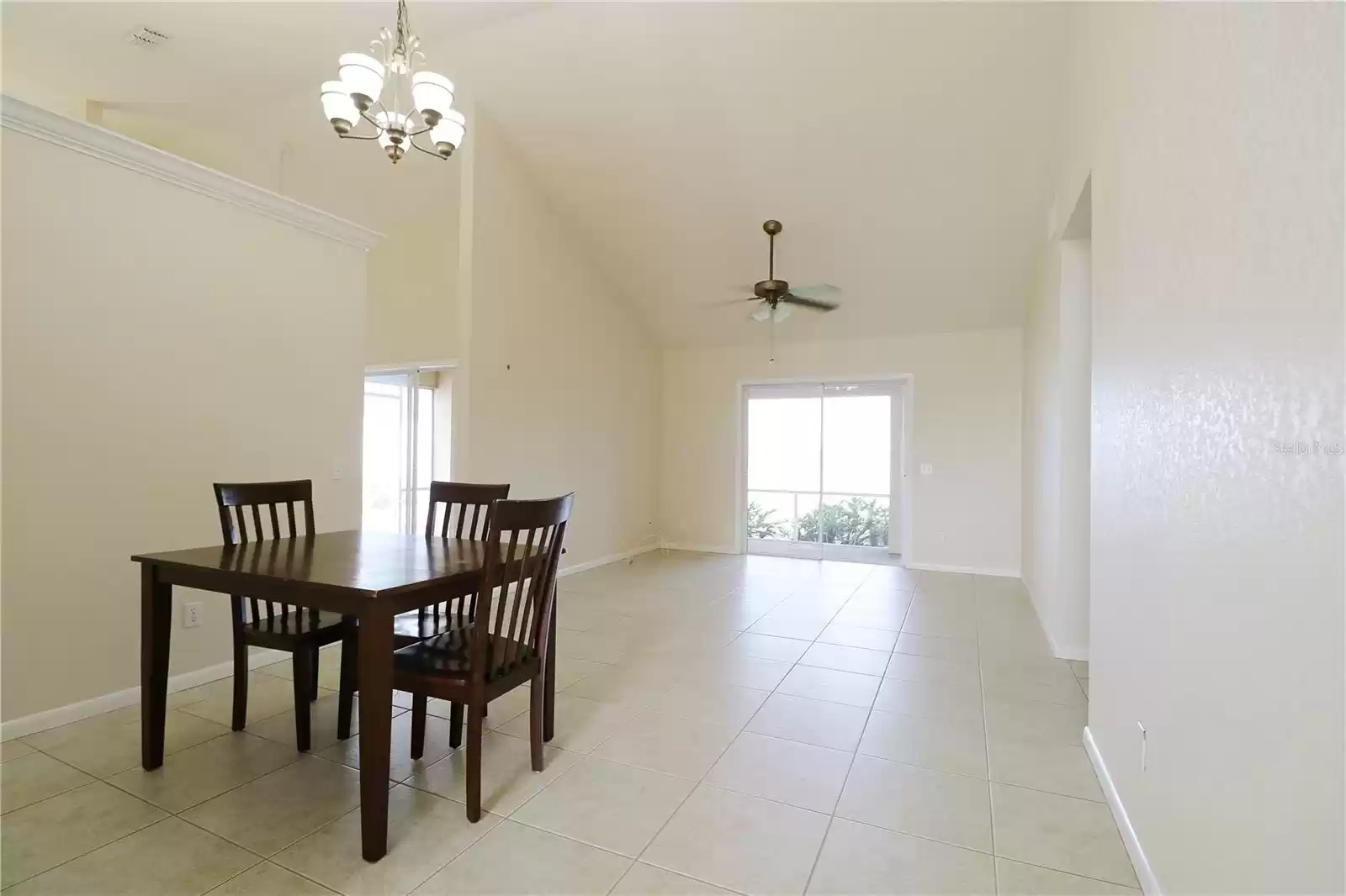 Living room/dining room combo with access to the large lanai