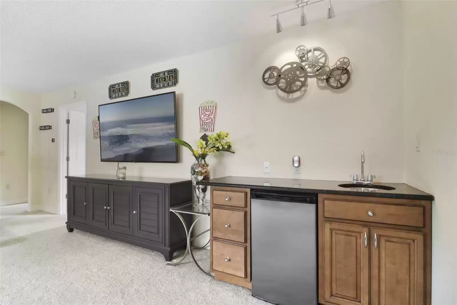 Upstairs living room with wet bar