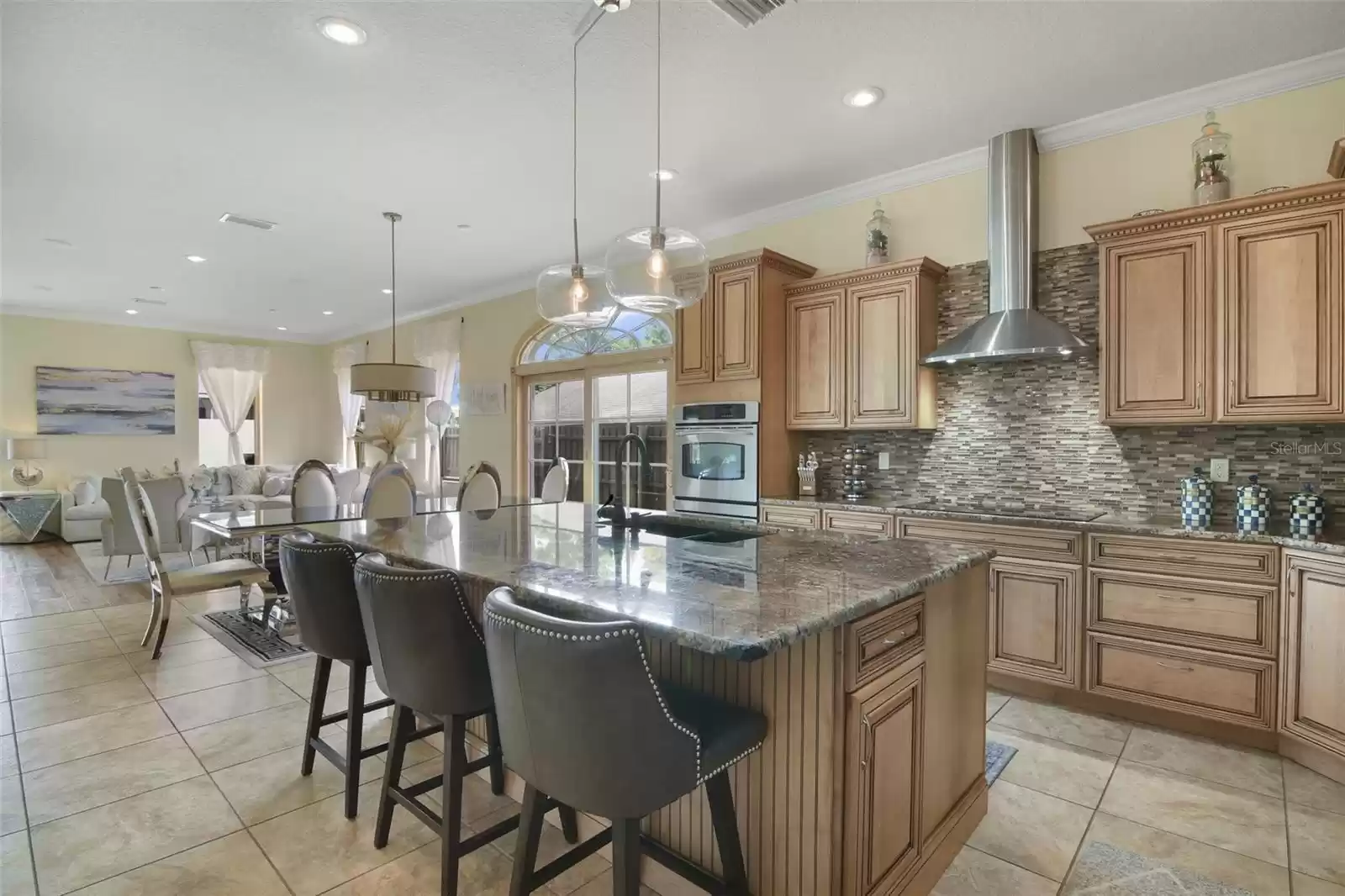 Kitchen with large island and barstool seating