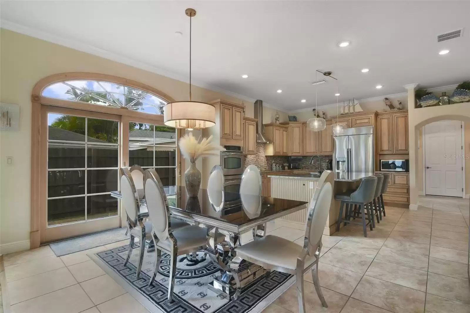 Dining area with slider door to backyard