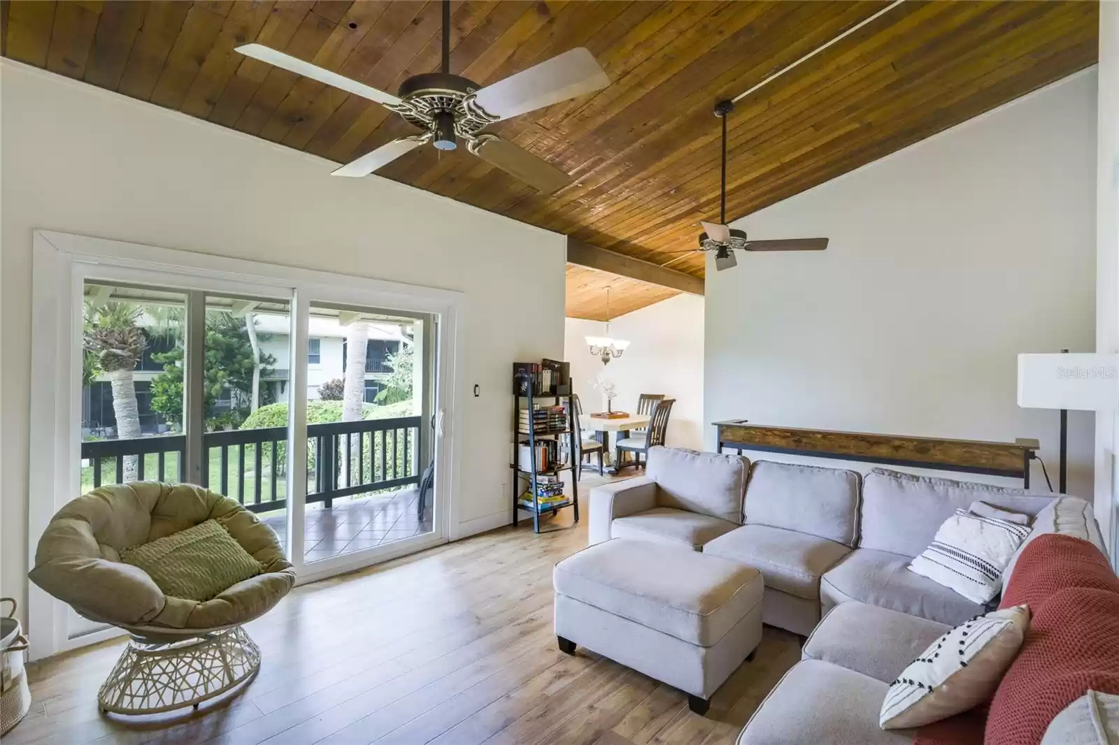 The generous living and dining areas offer NEW LUXURY VINYL PLANK WOOD FLOORS for easy maintenance and flow naturally into the charming galley style kitchen.